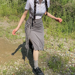 Side slit strap layered binding skirt