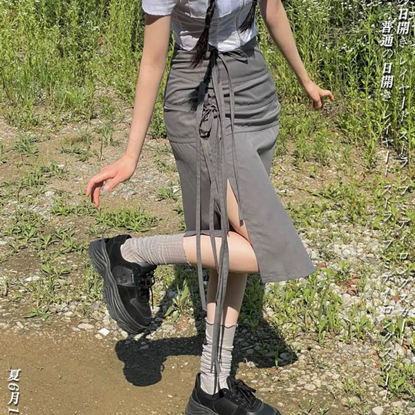 Side slit strap layered binding skirt