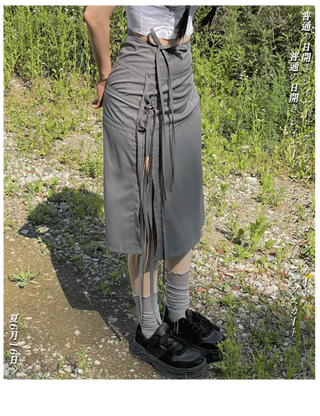 Side slit strap layered binding skirt