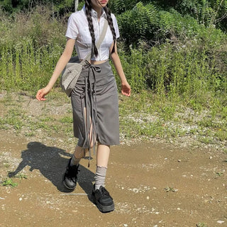 Side slit strap layered binding skirt