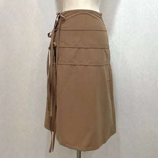 Side slit strap layered binding skirt