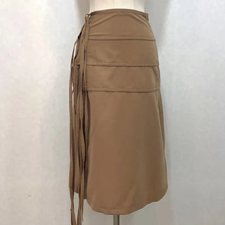 Side slit strap layered binding skirt