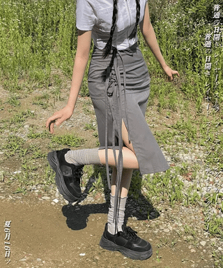 Side slit strap layered binding skirt