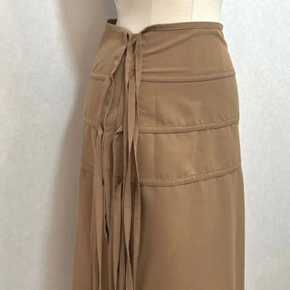 Side slit strap layered binding skirt