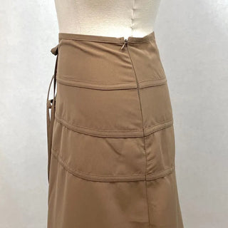 Side slit strap layered binding skirt