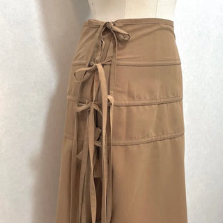 Side slit strap layered binding skirt