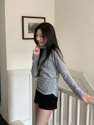 Ible High Neck Polar Diagonal Button Shirring Long Sleeve T-Shirt