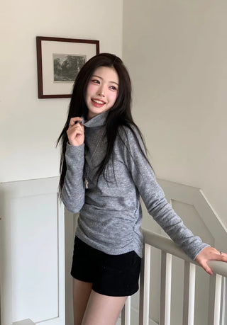 Ible High Neck Polar Diagonal Button Shirring Long Sleeve T-Shirt