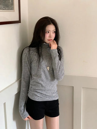 Ible High Neck Polar Diagonal Button Shirring Long Sleeve T-Shirt