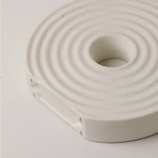 Donut-shaped ceramic flower vase