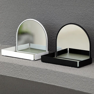 Arched storage tray with mirrorin  for storing small items.