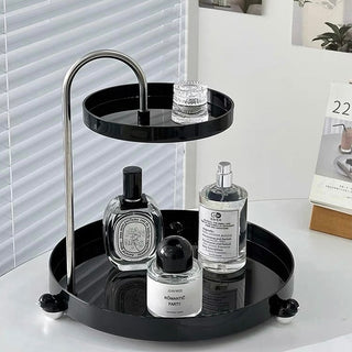 Top slide round two-tier trayin  for cosmetic storage.