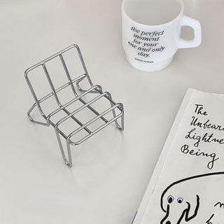 Chair motif smartphone stand silver object
