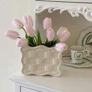 Biscuit motif flower vase.