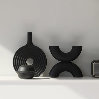 Donut-shaped ceramic flower vase