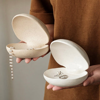 Shell motif natural ceramic accessory tray   perfect for holding small items plates or trays.
