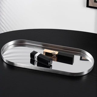 Stainless steel silver oval-shaped simple accessory trayin 3 sizes for storage.