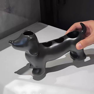 Dachshund motif ceramic toothbrush holder dog-themed storage bathroom sink.