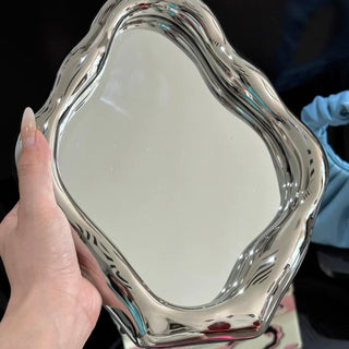 Silver nuance frame mirror tabletop or wall-mounted mirror.