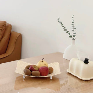 Wavy pattern large tray with legsin  for storage.