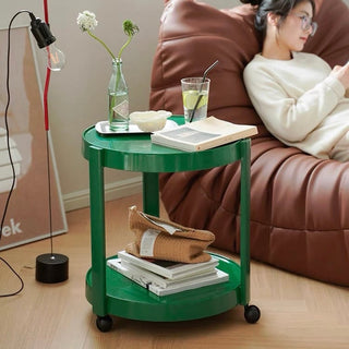 Two-tiered round side table with castersin .