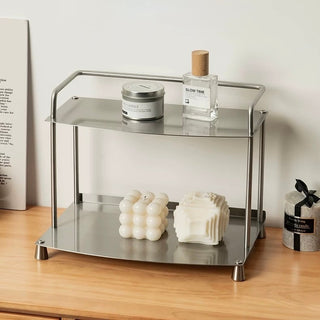 Stainless steel silver storage two-tier display rack for cosmetics and perfumes.