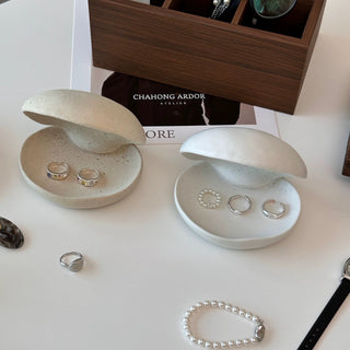 Shell motif natural ceramic accessory tray   perfect for holding small items plates or trays.