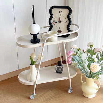 Oval-shaped storage wagon with castersin  side table