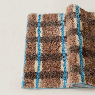 Brown and blue checkered door mat 50x80cm absorbent non-slip tufted.