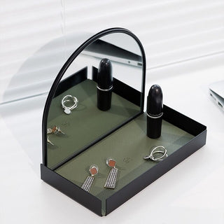 Arched storage tray with mirrorin  for storing small items.