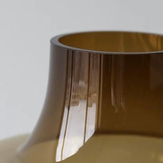 Brown color Clear glass flower vasein 2 sizes.