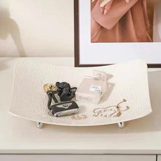 Wavy pattern large tray with legsin  for storage.