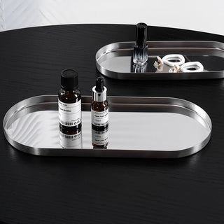 Stainless steel silver oval-shaped simple accessory trayin 3 sizes for storage.