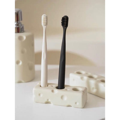 Cheese motif ceramic toothbrush stand