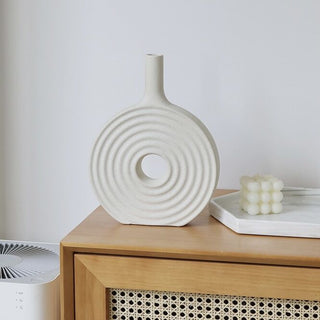Donut-shaped ceramic flower vase