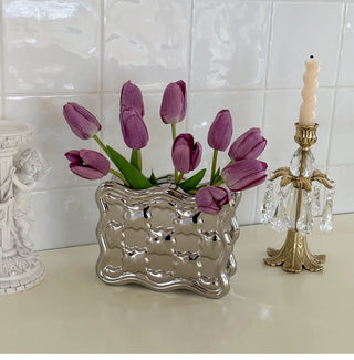 Biscuit motif flower vase.
