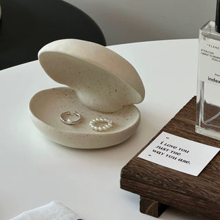 Shell motif natural ceramic accessory tray   perfect for holding small items plates or trays.
