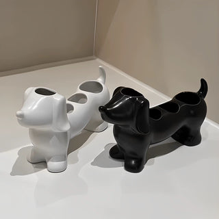 Dachshund motif ceramic toothbrush holder dog-themed storage bathroom sink.