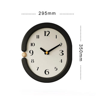 Oval-shaped monochrome modern art wall clock