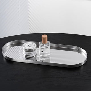 Stainless steel silver oval-shaped simple accessory trayin 3 sizes for storage.