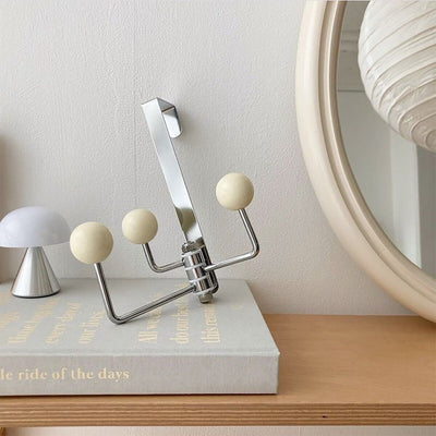 Ball-shaped movable triple door hookin  hanger hook