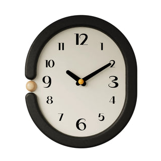 Oval-shaped monochrome modern art wall clock