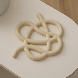 Knot Design Ceramic Trivet    Object