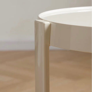 Two-tiered round side table with castersin .
