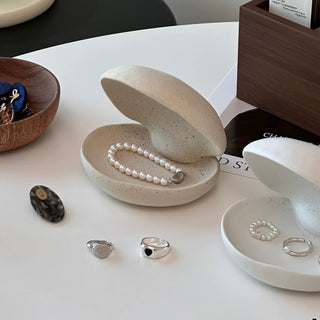 Shell motif natural ceramic accessory tray   perfect for holding small items plates or trays.