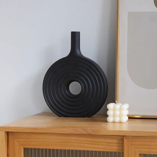 Donut-shaped ceramic flower vase