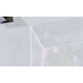 Square-shaped clear cosmetic boxin  for makeup storage.