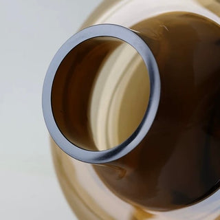 Brown color Clear glass flower vasein 2 sizes.