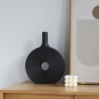 Donut-shaped ceramic flower vase