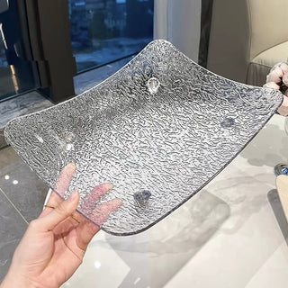 Wavy pattern large tray with legsin  for storage.